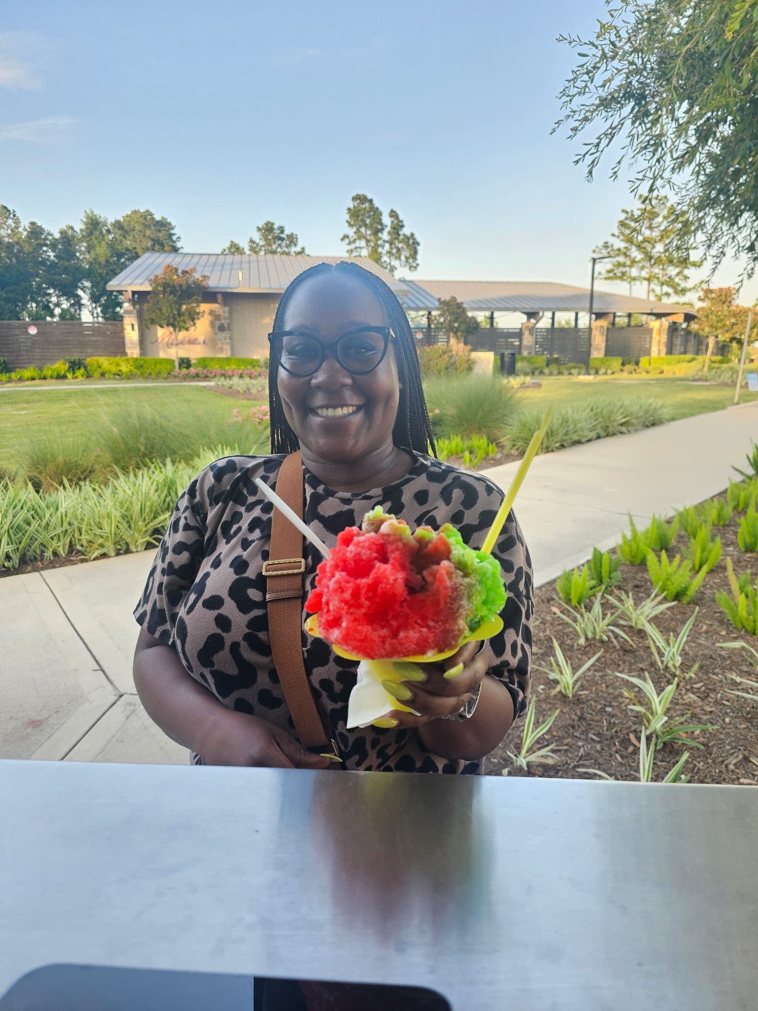 Rainbow shaved ice park evening — Frostbite Shaved Ice N'More