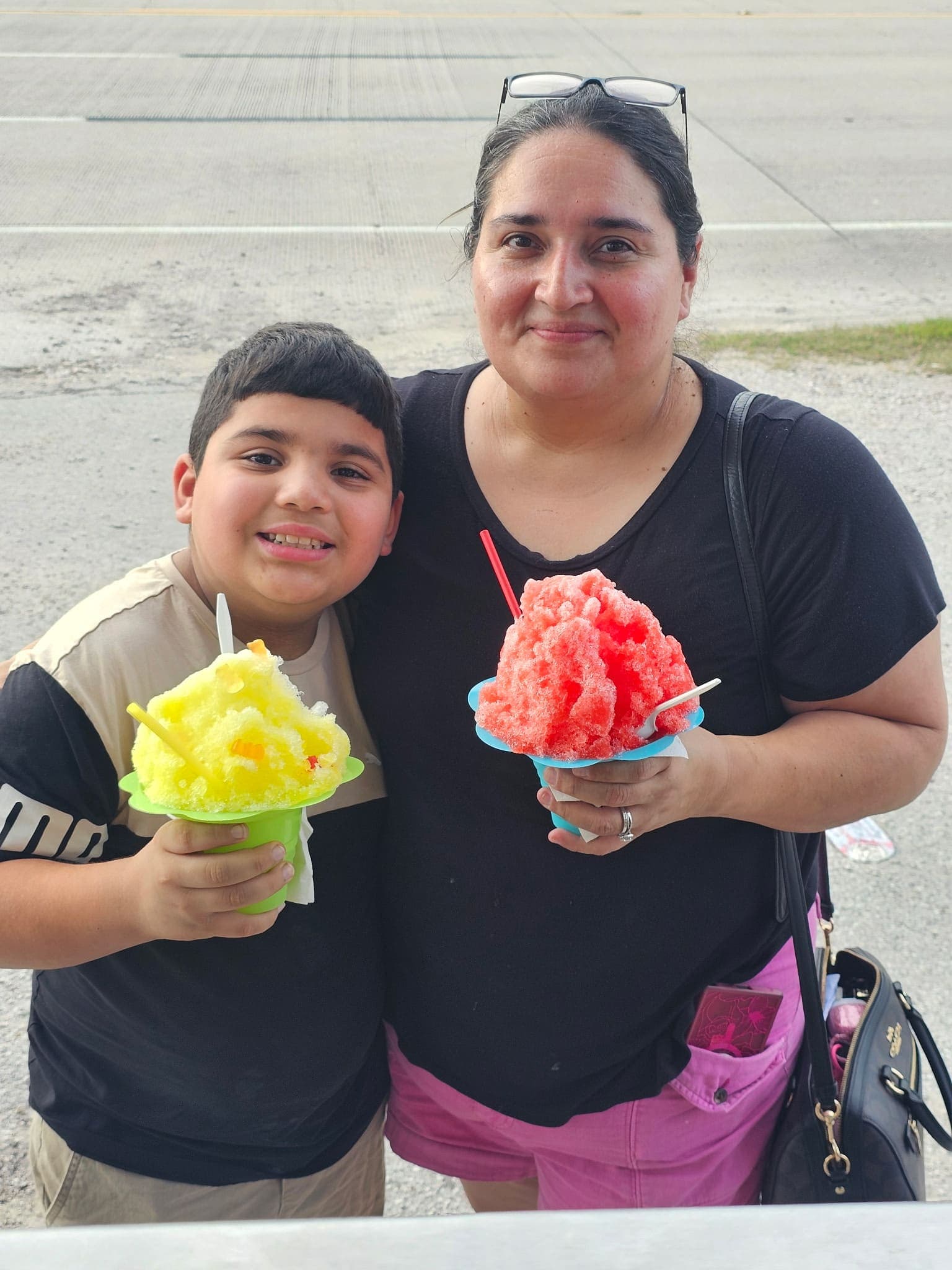 Mother son yellow red shaved ice — Frostbite Shaved Ice N'More
